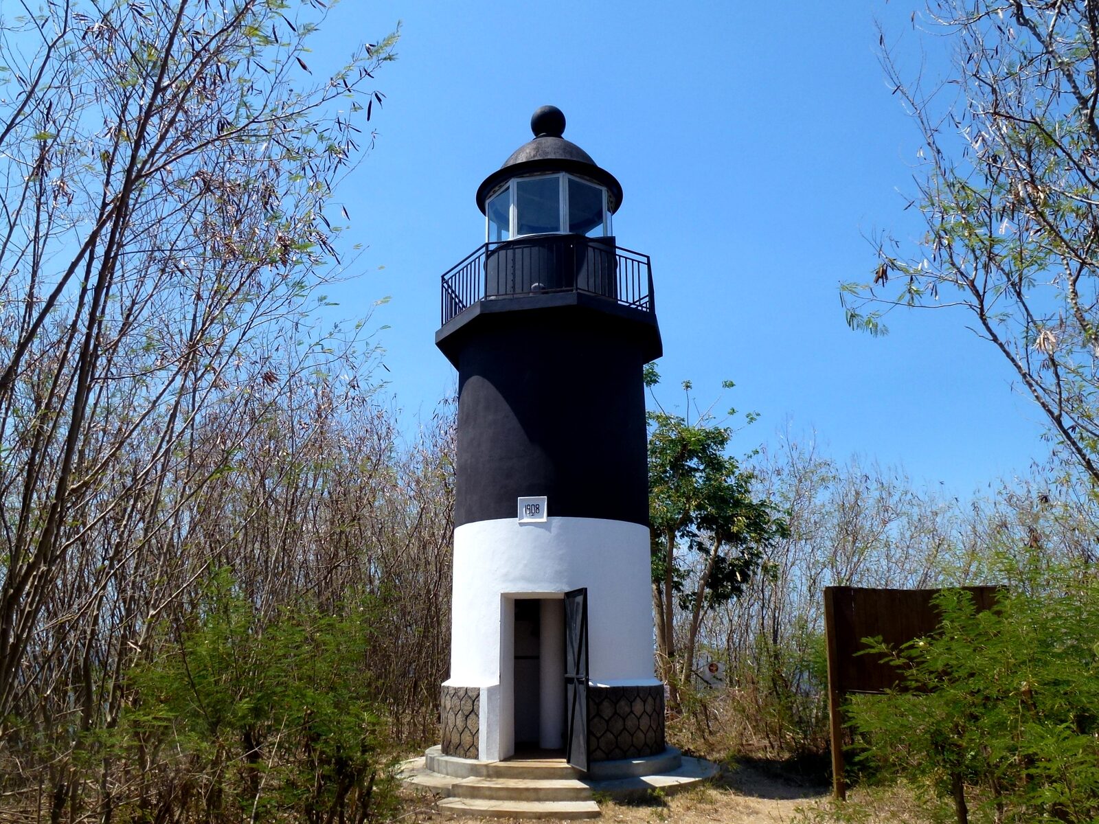 A lighthouse on Nosy Tanikely, Madagascar, overlooking waters managed as a marine protected area